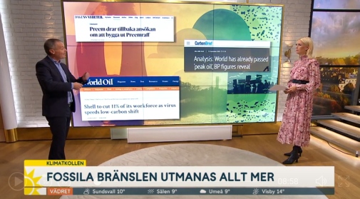 Forskare Johan Kuylenstierna i TV4s studio, pratar framför en stor skärm