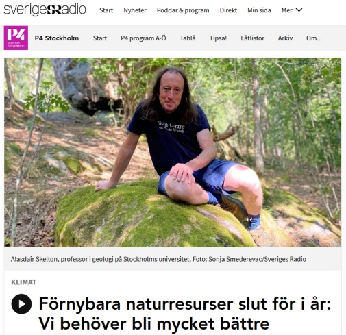 Professor Alasdiar Skelton sitting on a rock in the woods. Photo: Sonja Smederevac/SR